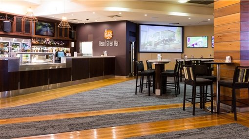 The Heard Street Bar, with its bar counter, high tables and big screens